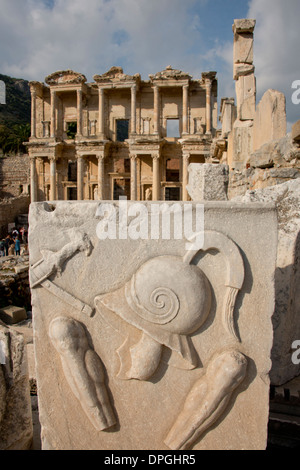 Turkey, Kusadasi, Ephesus, Marble carving with Roman helmet in front of the historic Celsus Library. Stock Photo