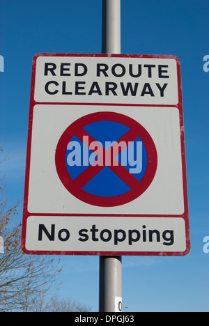 british road sign indicating a red route clearway with no stopping allowed Stock Photo