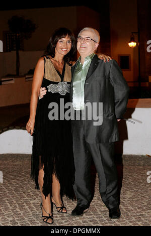 Oct 05, 2006 - Lisbon, Portugal - CARLOS CASTRO and FILOMENA CARDINALI during his 60th birthday party in Almada on October 5, 2006. January 2011 65 year old Portugese journalist, Carlos de Castro who was bludgeoned to death in a luxury NYC hotel room and whom also had his scrotum cut off. Foul play indeed. At present authorities are questioning his 20 something male lover- Renato S Stock Photo
