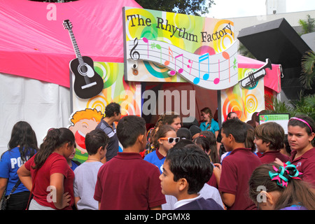 Miami Florida,Book Fair International,Miami Dade College,festival,Children's Alley,student students class field trip,classmates,tent,exhibitor,The Rhy Stock Photo