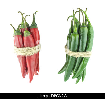Two sets of red and green hot chili pepper on a white background Stock Photo