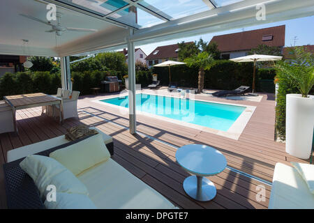 Private house with conservatory, lounge, pool and terrace, Germany, Europe - August 2013 Stock Photo