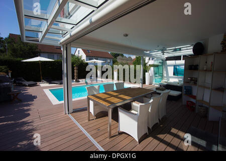 Private house with conservatory, lounge, pool and terrace, Germany, Europe - August 2013 Stock Photo