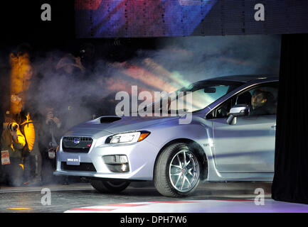 Detroit, USA. 14th Jan, 2014. The Subaru WRX STI is introduced during the press preview of the 2014 North American International Auto Show (NAIAS) in Detroit, the United States, Jan. 14, 2014. Credit:  Zhang Jun/Xinhua/Alamy Live News Stock Photo