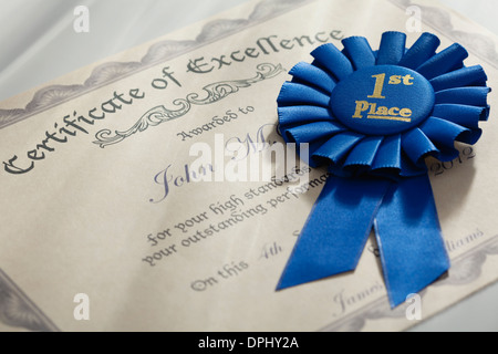 Certificate of excellence and blue ribbon Stock Photo