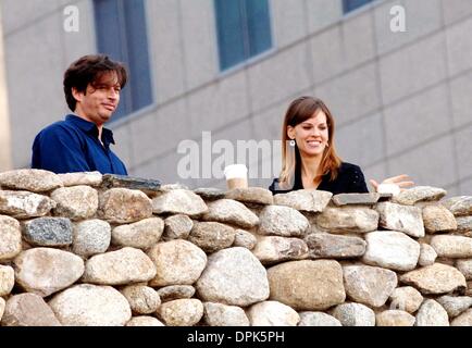 Nov. 27, 2006 - New York, new york - Hilary Swank   (  &  Harry  Connick Jr.)  films  P.S.I  LOVE YOU   in Manhattan   and  laughs  with  mystery  man  while her body  guard  looks out  on  November 27, 2006... Andrea Renault  /    K50855R(Credit Image: © Globe Photos/ZUMAPRESS.com) Stock Photo