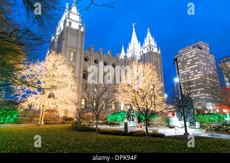 Salt Lake Temple in Temple Square at dusk lit up for Christmas. Stock Photo