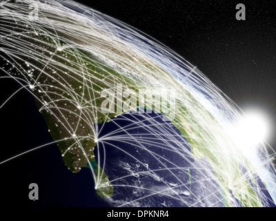 Network concept with sun rising over Indian subcontinent viewed from space. Highly detailed planet surface with clouds and city lights. Elements of this image furnished by NASA. Stock Photo