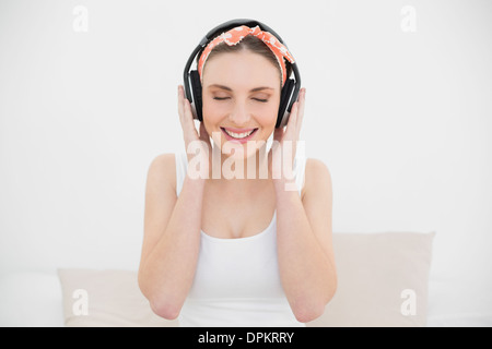 Woman wearing headphones with closed eyes Stock Photo