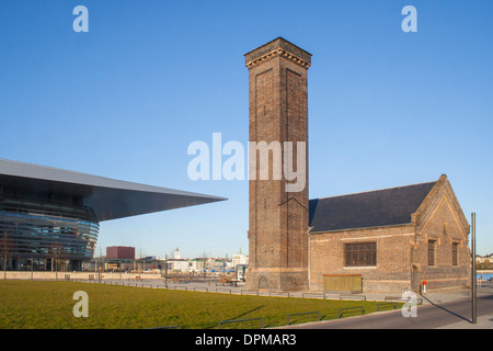 Old industrial building and Copenhagen Opera House on Holmen Island, Copenhagen, Denmark Stock Photo