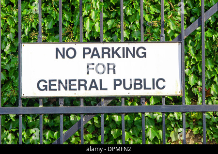 No parking sign on iron gate Stock Photo