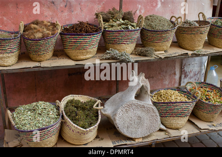 Stall selling herbs, spices and a whale vertebra in the Medina, Marrakech, Morocco Stock Photo