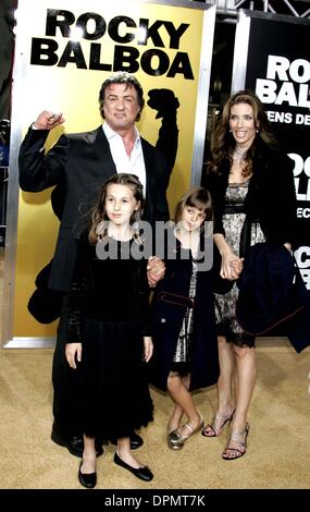 Dec. 14, 2006 - Graumans Chinese, Hollywood, LOS ANGELES, USA - SYLVESTER STALLONE, JENNIFER FLAVIN, DAUGHTERS.ACTOR, WIFE & DAUGHTERS.K51081.WORLD PREMIERE OF ROCKY BALBOA AT GRAUMANS CHINESE THEATRE HOLLYWOOD , CA  12-13-2006.(Credit Image: © Globe Photos/ZUMAPRESS.com) Stock Photo