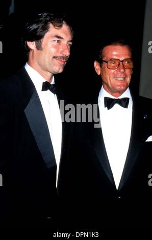 Mar. 24, 2006 - L8084LR.TIMOTHY DALTON AND ROGER MOORE. LISA ROSE -    1994.ROGERMOORERETRO(Credit Image: © Globe Photos/ZUMAPRESS.com) Stock Photo