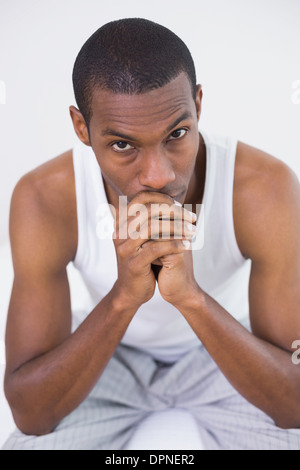 Portrait of a thoughtful young Afro man Stock Photo
