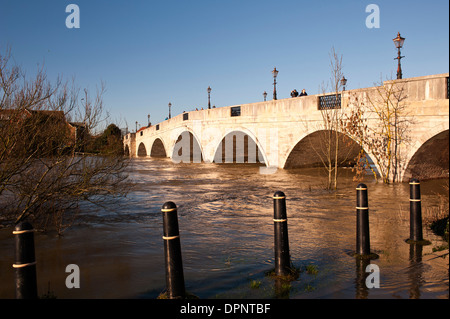 Chertsey Bridge with a flooded River Thames Chertsey Surrey England UK Stock Photo
