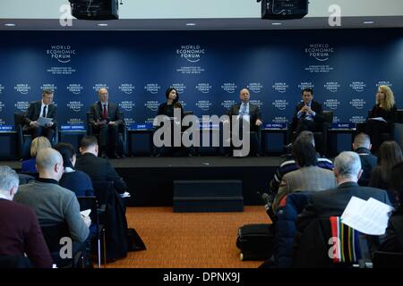Geneva, WEF headquarters in Geneva. 15th Jan, 2014. Klaus Schwab (3rd R rear), founder and executive chairman of the World Economic Forum (WEF), addresses a press conference at the WEF headquarters in Geneva, Jan. 15, 2014. The World Economic Forum (WEF) Annual Meeting scheduled for Jan. 22-26 in Davos of Switzerland would be a platform for global elites to probe into a variety of underlining issues in today's world, said founder of WEF on Wednesday. Credit:  Wang Siwei/Xinhua/Alamy Live News