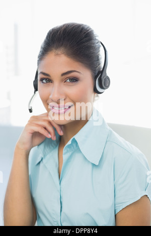 Close up of a businesswoman wearing headset Stock Photo