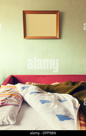 Details of an old furniture, bed ready for sleep. Stock Photo