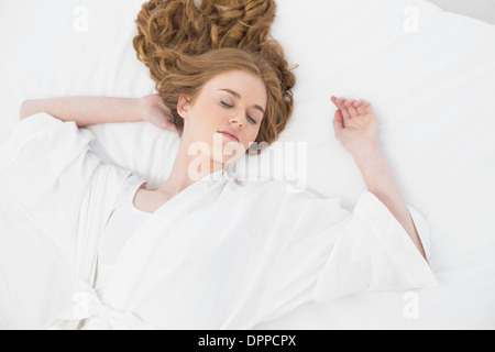 Overhead view of pretty blond sleeping in bed Stock Photo