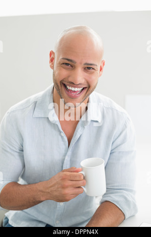 Young Handsome Bald Man Drinking Glass Of Healthy Orange Juice Covering Mouth With Hand Shocked And Afraid For Mistake Surprised Expression Stock Photo Alamy