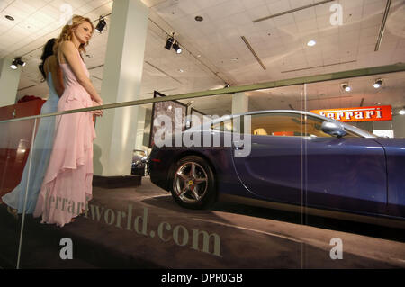 Jan. 05, 2006 - Los Angeles, California, USA - Show models wait for the Ferrari exhibit to debut for the press at the Greater LA Auto Show, in the Convention Center in Los Angeles, CA., on Thursday, Jan. 5, 2006. (Credit Image: © Brian Cahn/ZUMAPRESS.com) Stock Photo