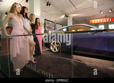 Jan. 05, 2006 - Los Angeles, California, USA - Show models wait for the Ferrari exhibit to debut for the press at the Greater LA Auto Show in the Convention Center in Los Angeles, CA., on Thursday, Jan. 5, 2006. (Credit Image: © Brian Cahn/ZUMAPRESS.com) Stock Photo