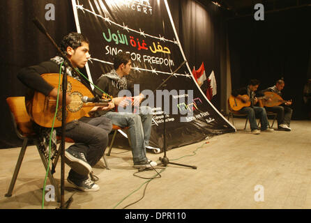 Nov 26, 2008 - Gaza City, Palestine, Gaza Strip - In a non-violent resistance to the year and a half siege, Palestinians performed a concert organized by the International Palestinian Campaign to end Gaza Siege in PNGO. The concert features performances by Palestinians in both Arabic and English at Rashad Shawa center. (Credit Image: © Fady Adwan/PROPA Images/ZUMA Press) Stock Photo