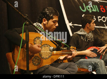 Nov 26, 2008 - Gaza City, Palestine, Gaza Strip - In a non-violent resistance to the year and a half siege, Palestinians performed a concert organized by the International Palestinian Campaign to end Gaza Siege in PNGO. The concert features performances by Palestinians in both Arabic and English at Rashad Shawa center. (Credit Image: © Fady Adwan/PROPA Images/ZUMA Press) Stock Photo