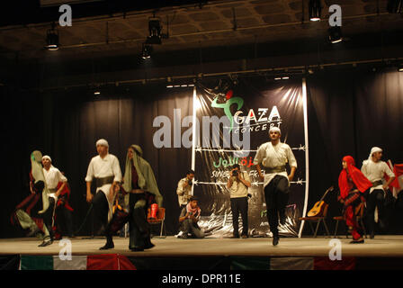 Nov 26, 2008 - Gaza City, Palestine, Gaza Strip - In a non-violent resistance to the year and a half siege, Palestinians performed a concert organized by the International Palestinian Campaign to end Gaza Siege in PNGO. The concert features performances by Palestinians in both Arabic and English at Rashad Shawa center. (Credit Image: © Fady Adwan/PROPA Images/ZUMA Press) Stock Photo