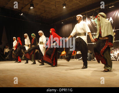 Nov 26, 2008 - Gaza City, Palestine, Gaza Strip - In a non-violent resistance to the year and a half siege, Palestinians performed a concert organized by the International Palestinian Campaign to end Gaza Siege in PNGO. The concert features performances by Palestinians in both Arabic and English at Rashad Shawa center. (Credit Image: © Fady Adwan/PROPA Images/ZUMA Press) Stock Photo