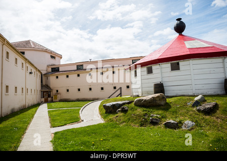 A replica of the San Juan de Salvamento lighthouse on display at the the Maritime Museum of Ushuaia. The museum consists of several wings devoted to maritime history, Antarctic exploration, an art gallery, and a policy and penitentiary museum. The complex is housed in an historic prison building and uses the original cells and offices as exhibit spaces. Stock Photo