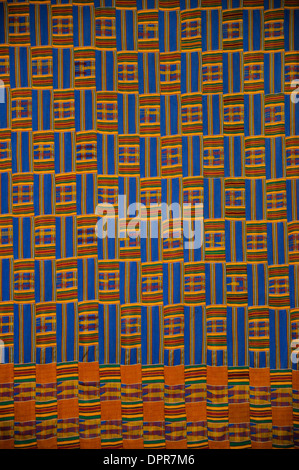 Ghana Men's Weave Kente cloth wall hanging in the Harold Washington Library Center, Chicago, IL. c. 1919 Cotton, silk, and rayon Stock Photo