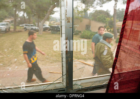 Dec 20, 2008 - Sderot, Israel - Just two days after the official end of the cease-fire, Gaza militants fired 10 Qassam rockets and 6 mortar shells into Israel, continuing the barrage of the past several days. Two of the mortar shells caused damage to a house in the Gaza vacinity. Gaza's Hamas rulers declared in a statement Friday that they would not continue a truce that had taken  Stock Photo