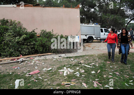 Dec 20, 2008 - Sderot, Israel - Just two days after the official end of the cease-fire, Gaza militants fired 10 Qassam rockets and 6 mortar shells into Israel, continuing the barrage of the past several days. Two of the mortar shells caused damage to a house in the Gaza vacinity. Gaza's Hamas rulers declared in a statement Friday that they would not continue a truce that had taken  Stock Photo