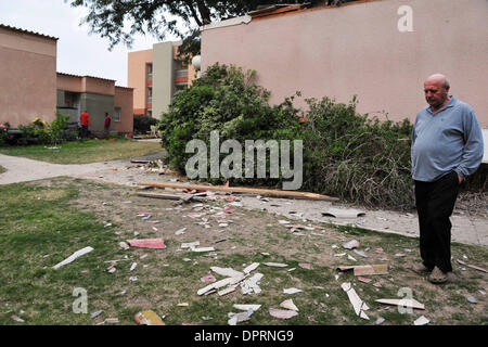 Dec 20, 2008 - Sderot, Israel - Just two days after the official end of the cease-fire, Gaza militants fired 10 Qassam rockets and 6 mortar shells into Israel, continuing the barrage of the past several days. Two of the mortar shells caused damage to a house in the Gaza vacinity. Gaza's Hamas rulers declared in a statement Friday that they would not continue a truce that had taken  Stock Photo