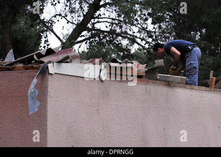 Dec 20, 2008 - Sderot, Israel - Just two days after the official end of the cease-fire, Gaza militants fired 10 Qassam rockets and 6 mortar shells into Israel, continuing the barrage of the past several days. Two of the mortar shells caused damage to a house in the Gaza vacinity. Gaza's Hamas rulers declared in a statement Friday that they would not continue a truce that had taken  Stock Photo