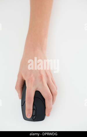 Close up of a hand using computer mouse Stock Photo