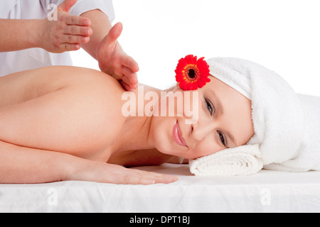 Beautiful Woman Enjoying Back Massage at Beauty Spa Stock Photo