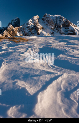 Looking across fresh autumn snow towards Monte Cernera (2657m), above the Giau Pass, Dolomites, Italy. Stock Photo