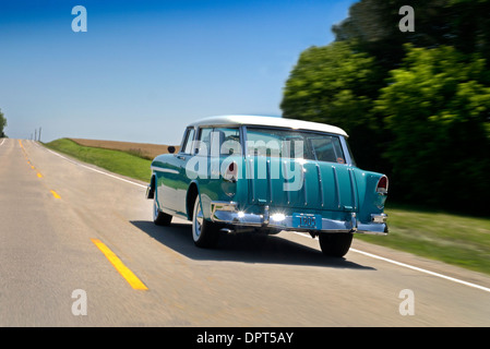 1955 Chevrolet BelAir Nomad driving on a road in rural Wisconsin USA Stock Photo