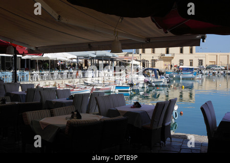 QUAYSIDE RESTAURANTS IN THE VENETIAN HARBOUR AT RETHYMNON. CRETE. Stock Photo