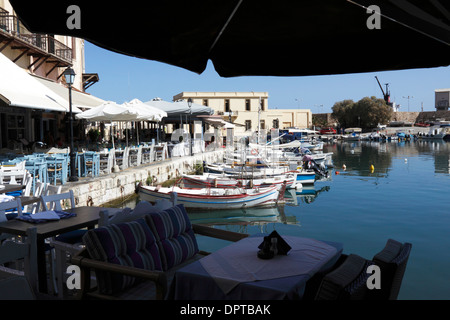 QUAYSIDE RESTAURANTS IN THE VENETIAN HARBOUR AT RETHYMNON. CRETE. Stock Photo