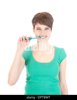 Young woman with toothbrush isolated on white background Stock Photo