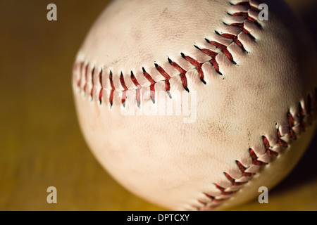 Close up of red stitching on a baseball Stock Photo