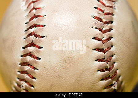 Close up of the red stitching on a baseball Stock Photo