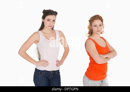 Unhappy female friends not talking after argument Stock Photo