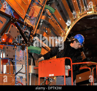 Jan 12, 2009 - Geneva, Switzerland - The CMS (Compact Muon Solenoid) detector at the Large Hadron Collider near Geneva, undergoes winter maintenance work. CERN ( the European Centre for Nuclear Research) developed the Large Hadron Collider (LHC) to carry out research into high energy particle collisions.  Protons accelerated at near light speed in opposite directions round a 27km c Stock Photo