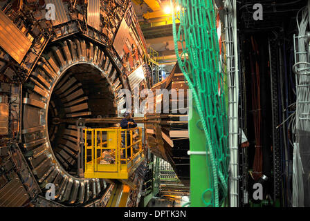 Jan 12, 2009 - Geneva, Switzerland - The CMS (Compact Muon Solenoid) detector at the Large Hadron Collider near Geneva, undergoes winter maintenance work. CERN ( the European Centre for Nuclear Research) developed the Large Hadron Collider (LHC) to carry out research into high energy particle collisions.  Protons accelerated at near light speed in opposite directions round a 27km c Stock Photo
