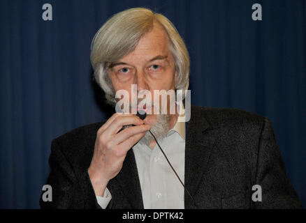 Jan 12, 2009 - Geneva, Switzerland - ROLF HEUER, Director General of CERN, tests his mike for his inaugural speech to staff at CERN, near Geneva. CERN ( the European Centre for Nuclear Research) developed the Large Hadron Collider (LHC) to carry out research into high energy particle collisions.  (Credit Image: © George Grassie/ZUMA Press) Stock Photo